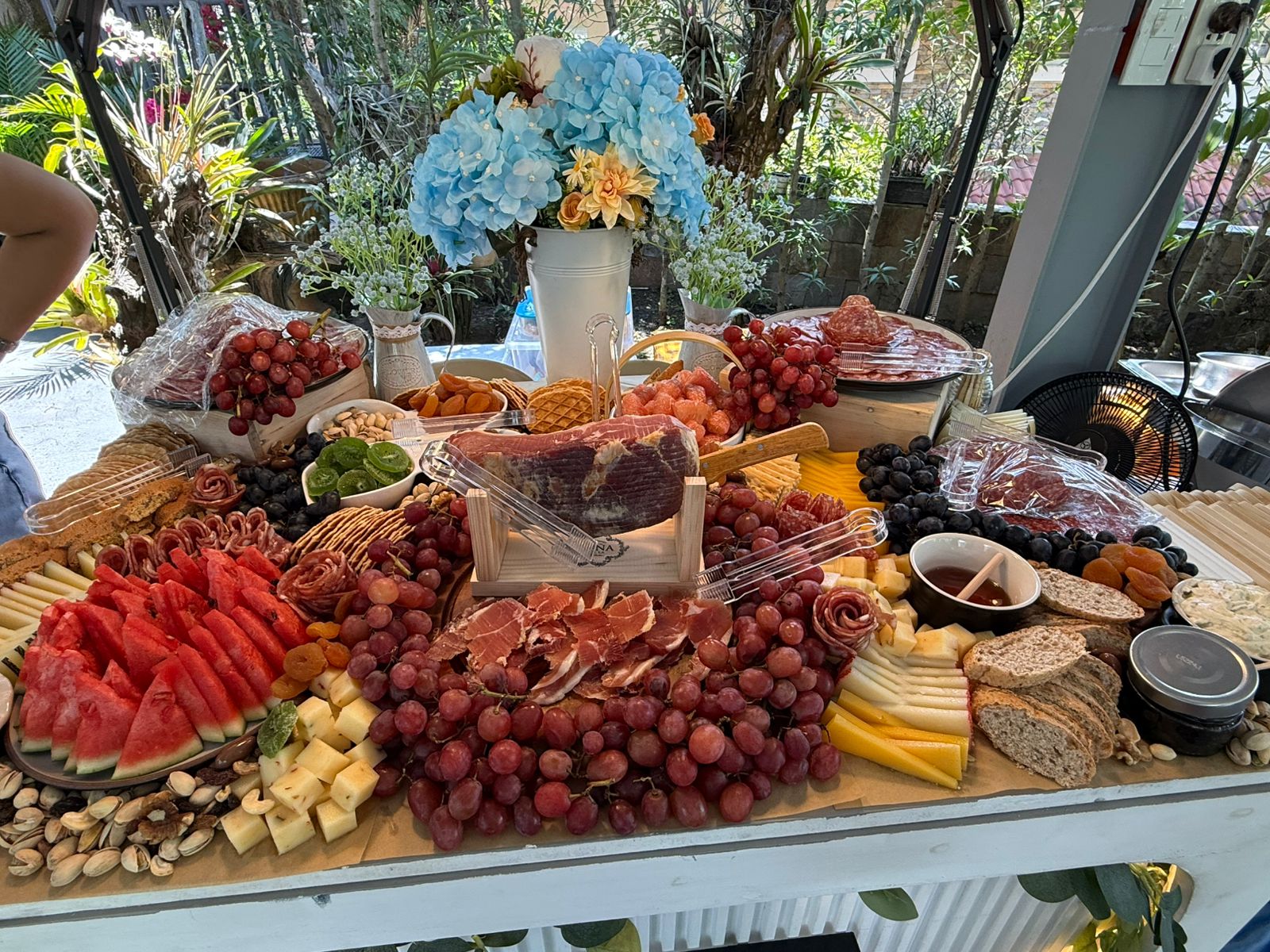 Charcuterie spread with flowers